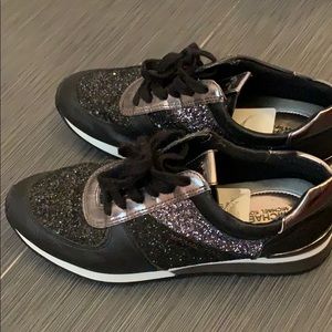 Micheal Kors black sneaker wear